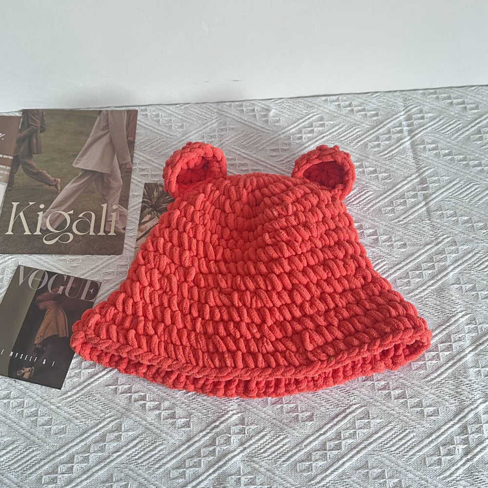 Black chunky crochet bucket hat with pink horns