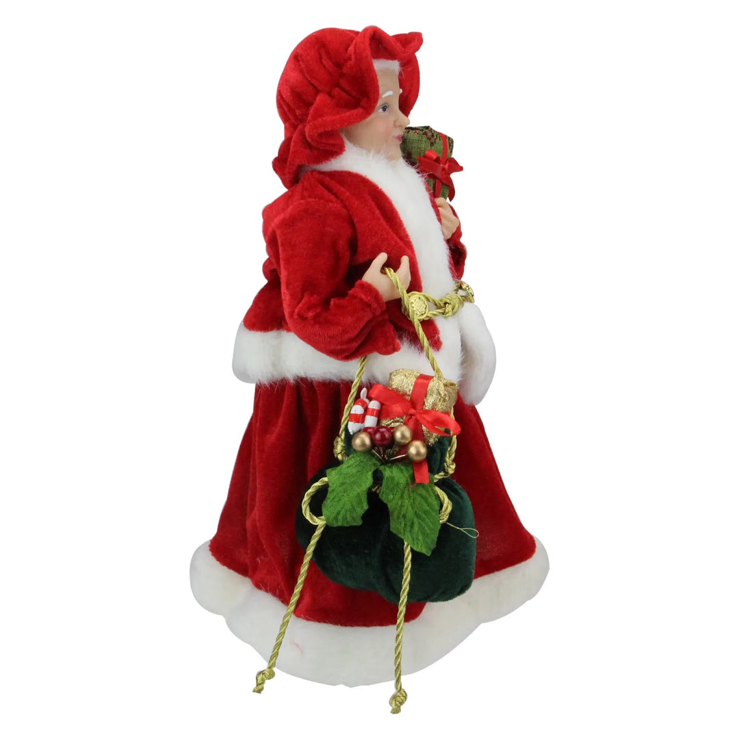 Mrs Claus figure with gift bag