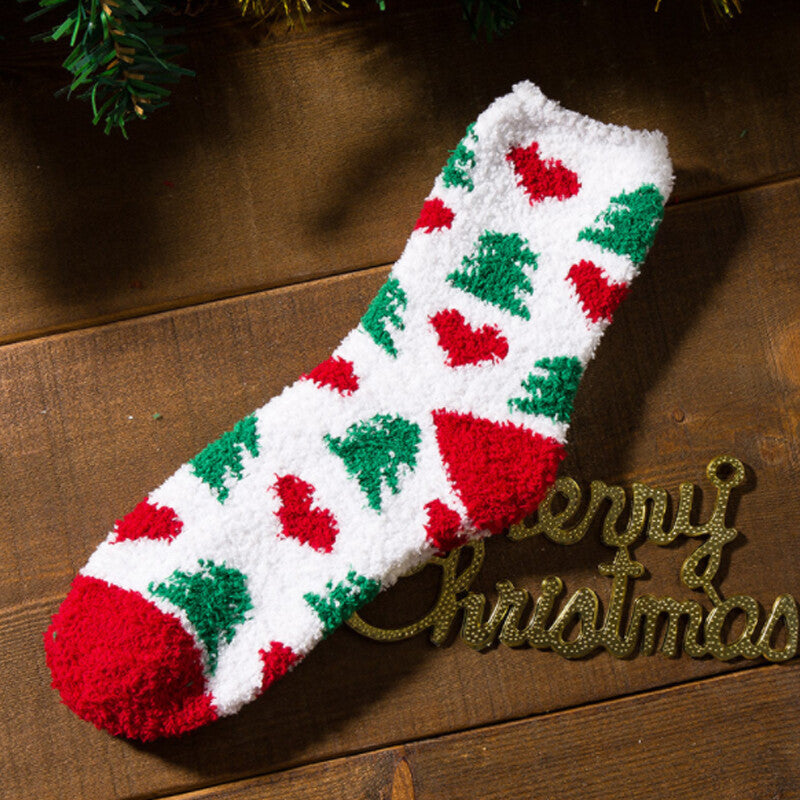 Five pairs of fuzzy Christmas socks