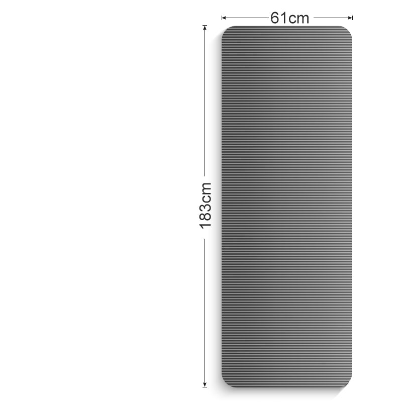 Rolled black yoga mat with carry strap