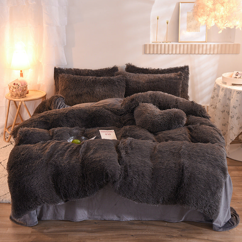 Fluffy plush bedding set on a bed