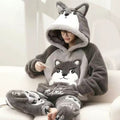 Man in a husky coral fleece hooded pajama set