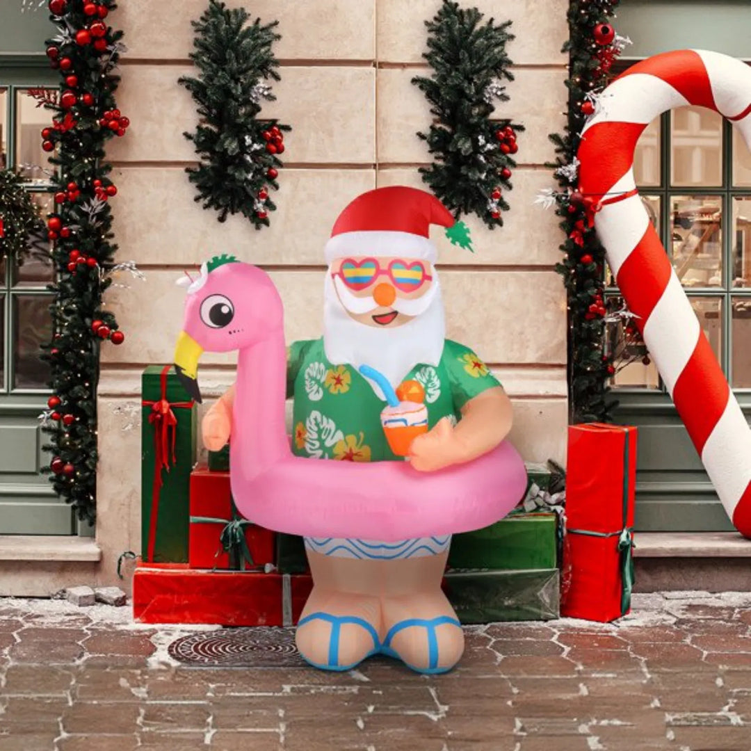Inflatable Santa on pink flamingo float