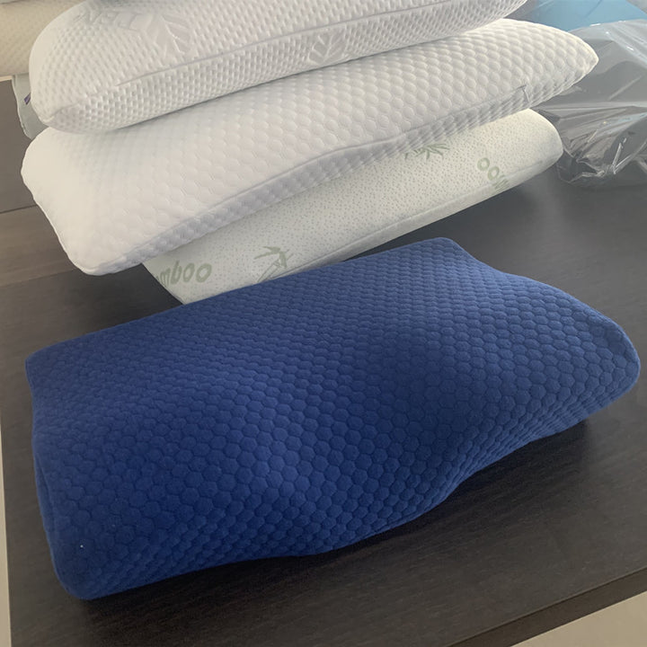 Contoured memory foam pillow with zip cover