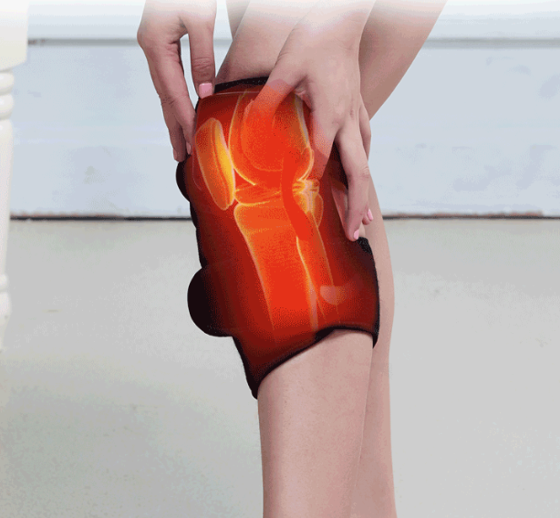 Black heated vibration wrap on knee