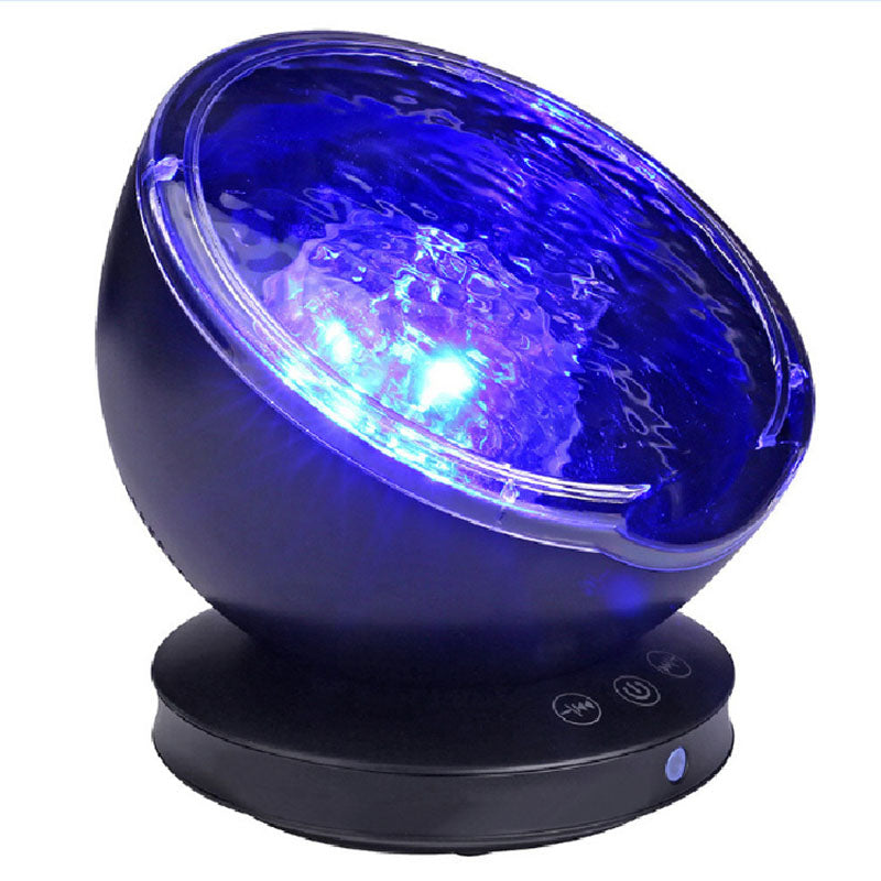 Ocean wave projector lighting a bedroom