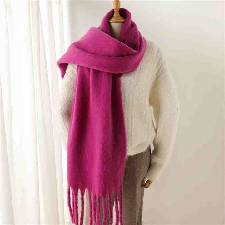 Woman wearing a fluffy mustard scarf