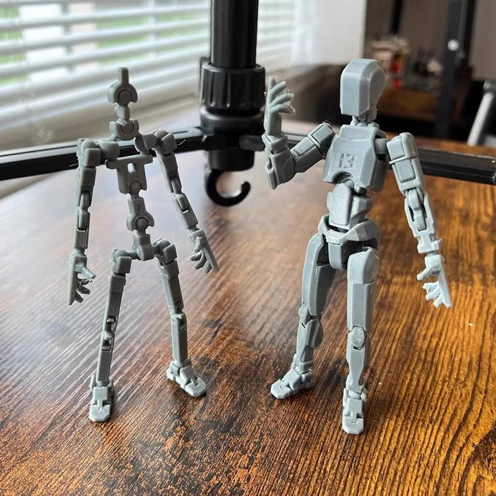 Orange poseable 3D printed robot figure