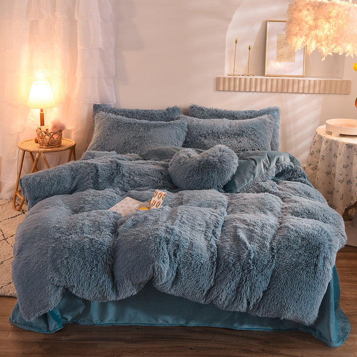 Fluffy plush bedding set on a bed