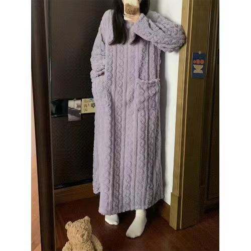 Woman in a long pink fleece nightgown