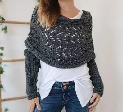 Woman wearing a knit shawl with sleeves