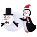 Inflatable penguin with giant snowball