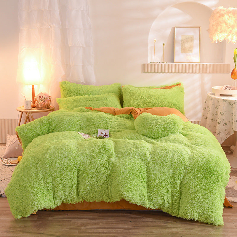 Fluffy plush bedding set on a bed