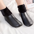 Black faux leather fleece-lined slipper boots