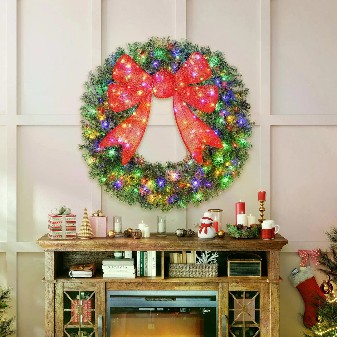 Giant lit Christmas wreath with red bow