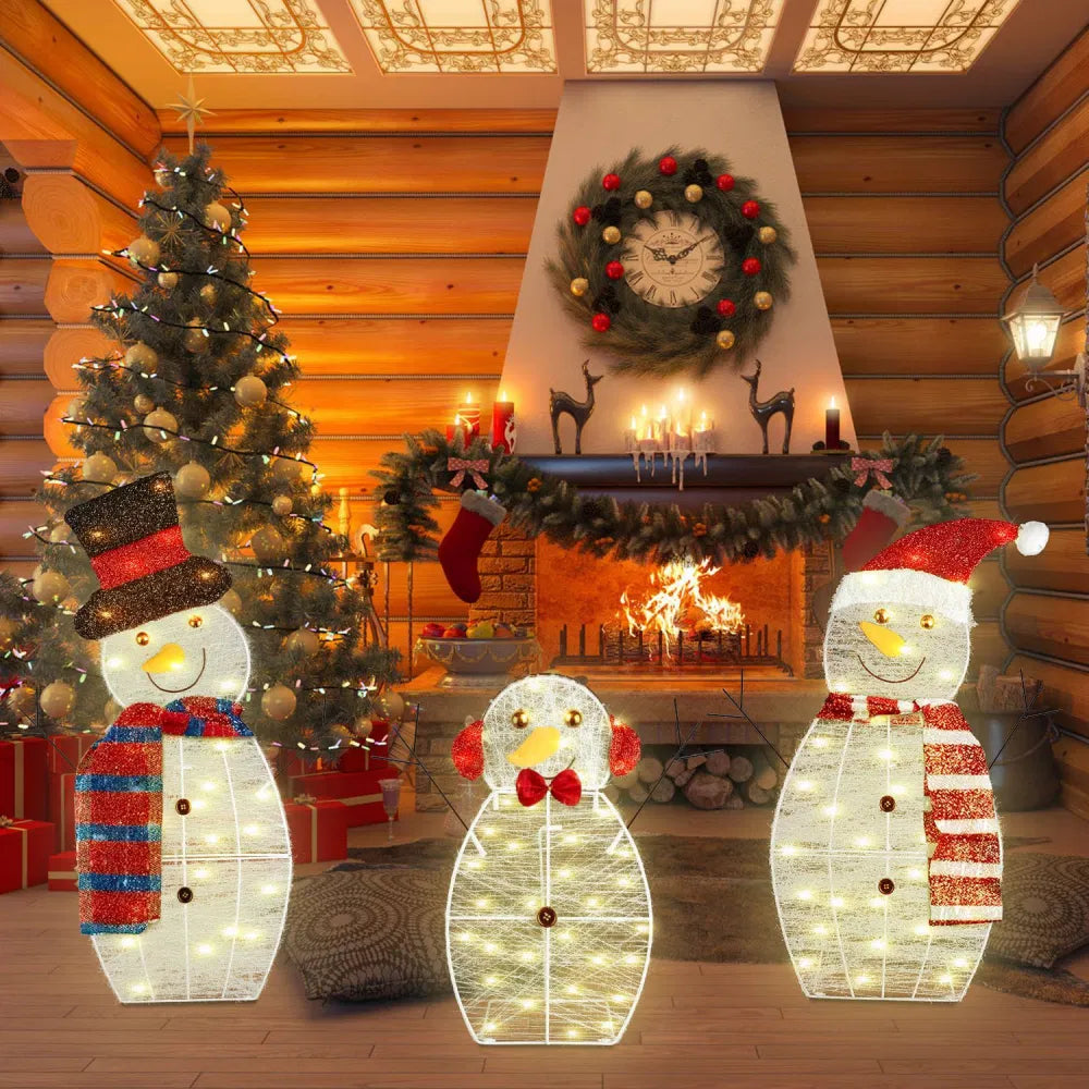 Light-up plush snowman family of three