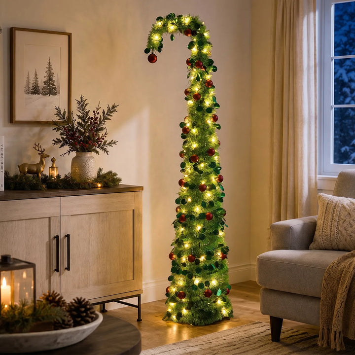 Green pop up Christmas tree with red ornaments