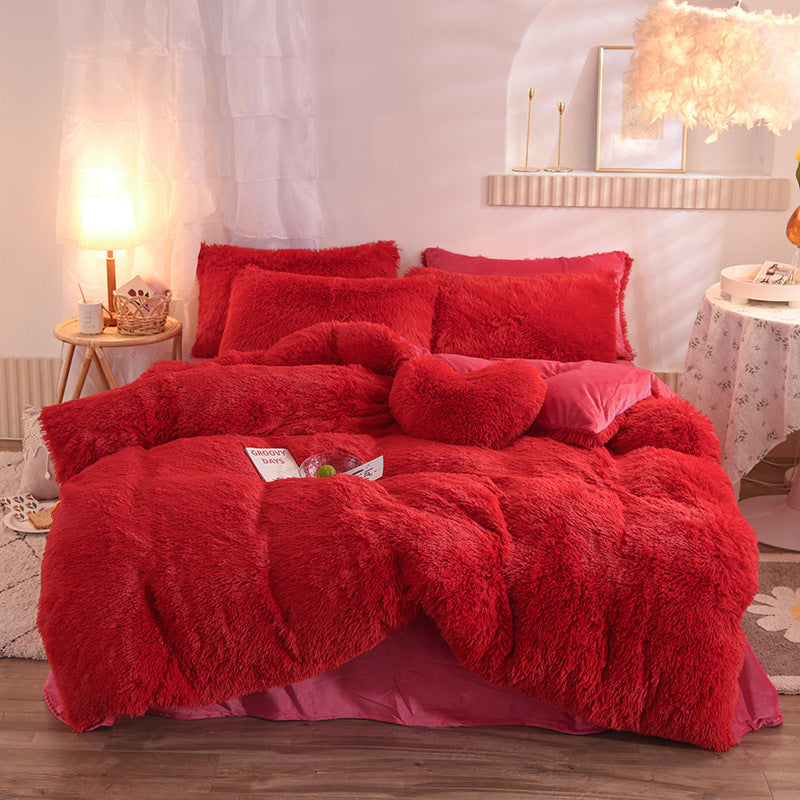 Fluffy plush bedding set on a bed