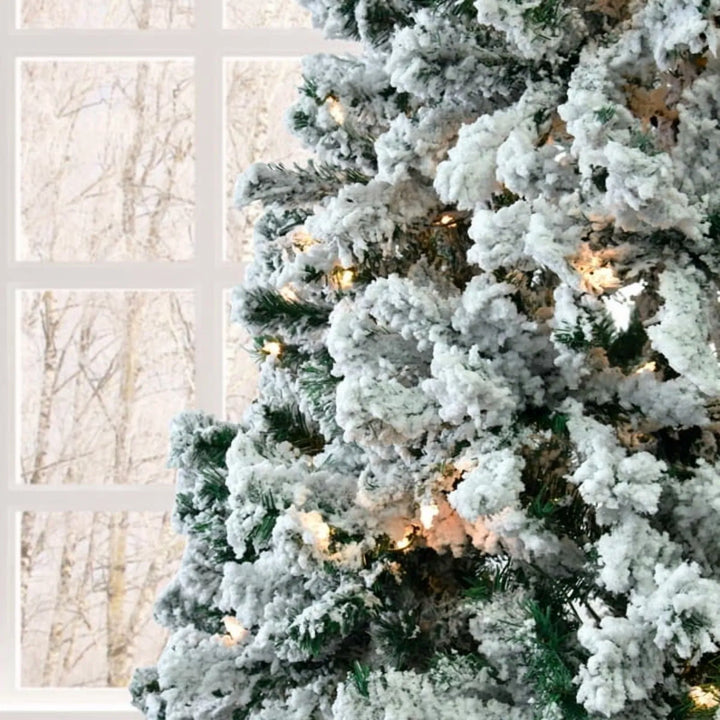 Pre-lit flocked tree with white LEDs