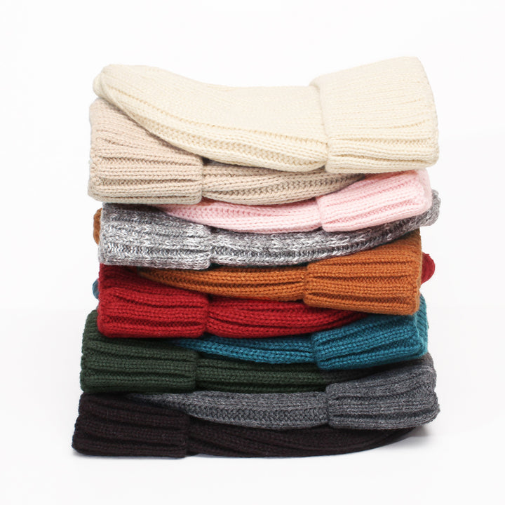Satin-lined ribbed knit beanie in cream