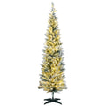 Pre-lit snow flocked pencil tree glowing warm