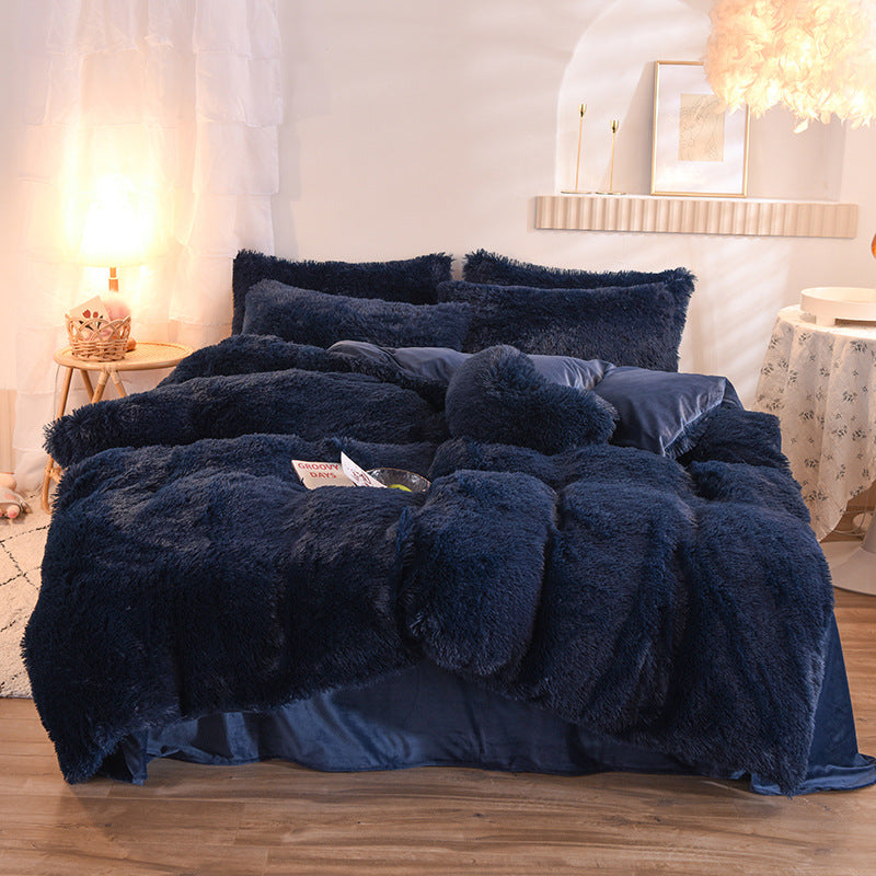 Fluffy plush bedding set on a bed