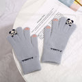 Pink knit gloves with small 3D panda