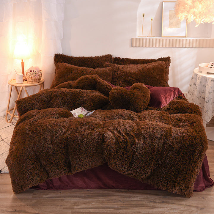 Fluffy plush bedding set on a bed