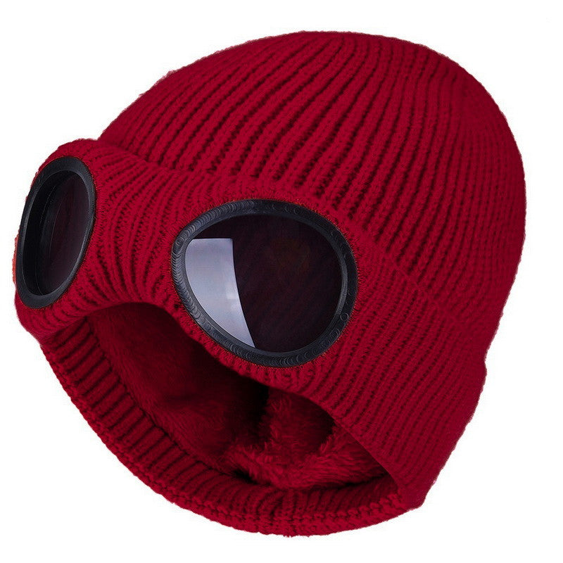 Knit beanie with flip-up goggles on front