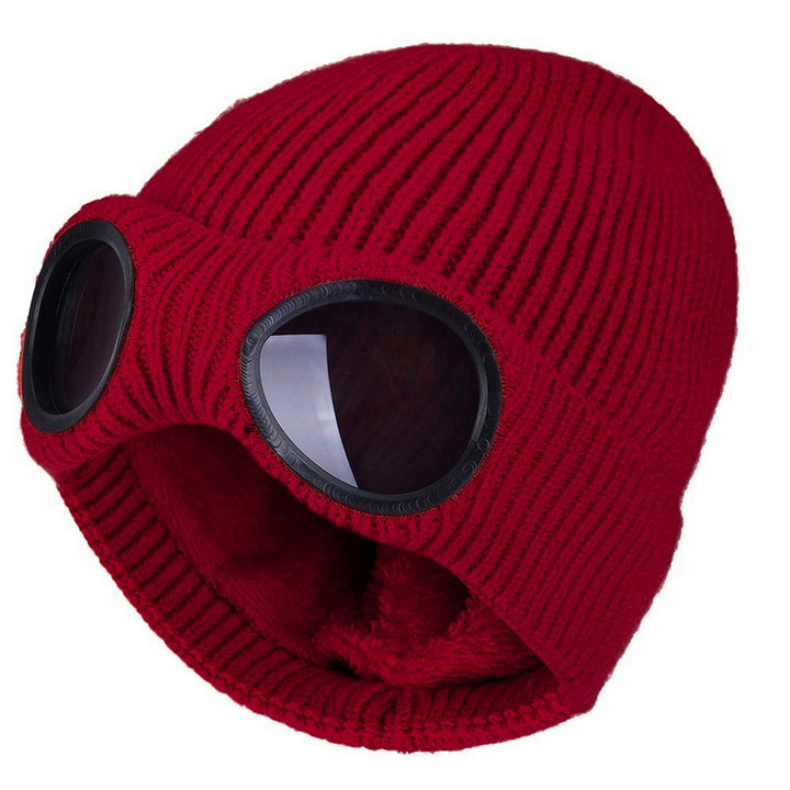 Knit beanie with flip-up goggles on front