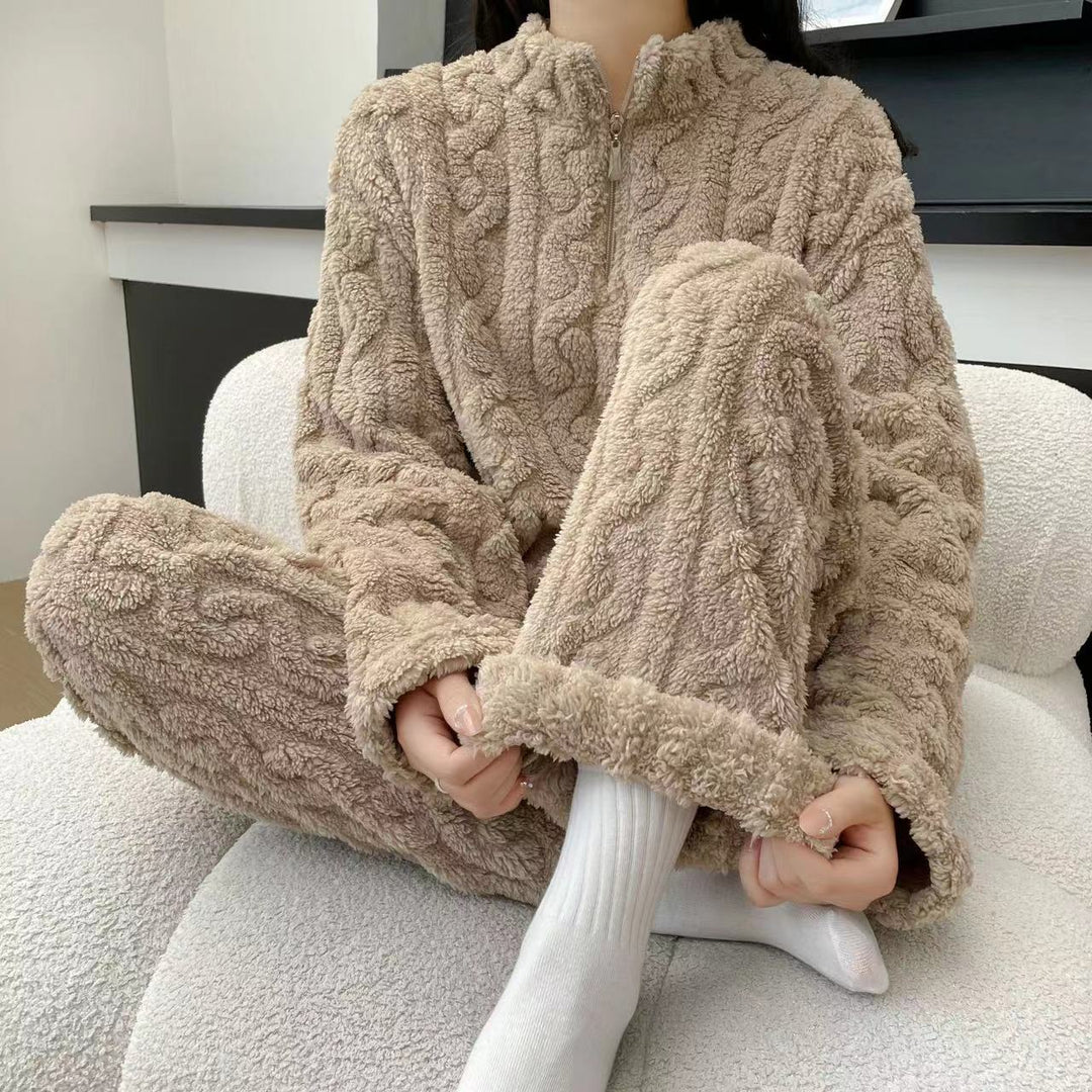 Woman in a half-zip fleece pajama set