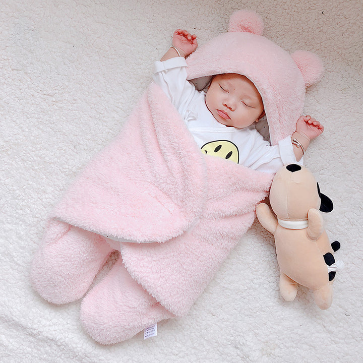 Baby in a bear ear sleep sack
