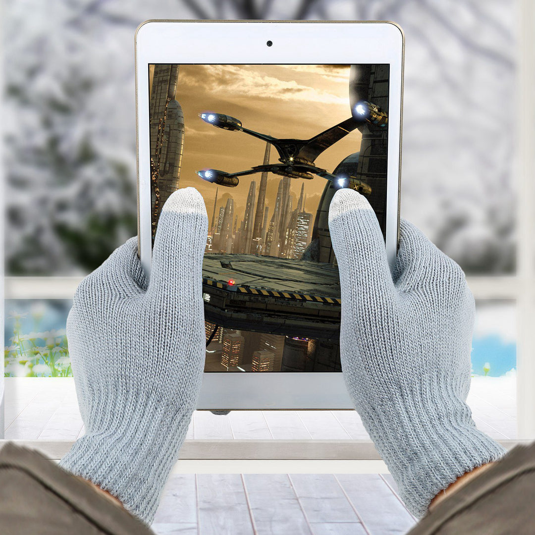 Knit touchscreen gloves holding a phone