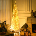 White pre-lit pencil Christmas tree with warm lights