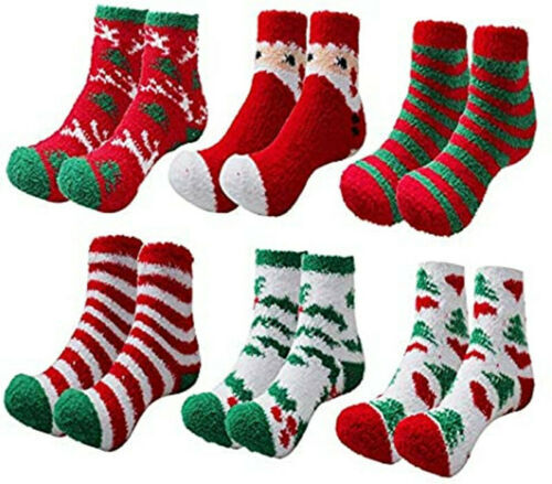 Five pairs of fuzzy Christmas socks