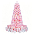 Pink flocked Christmas tree with warm lights