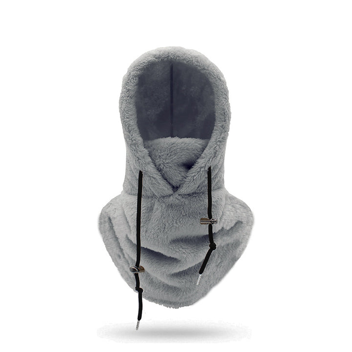 Woman wearing a plush hooded scarf