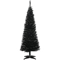Slim black pencil Christmas tree in corner