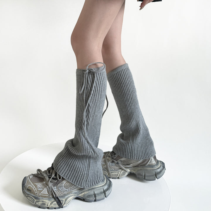 Flared ribbed leg warmers with tie