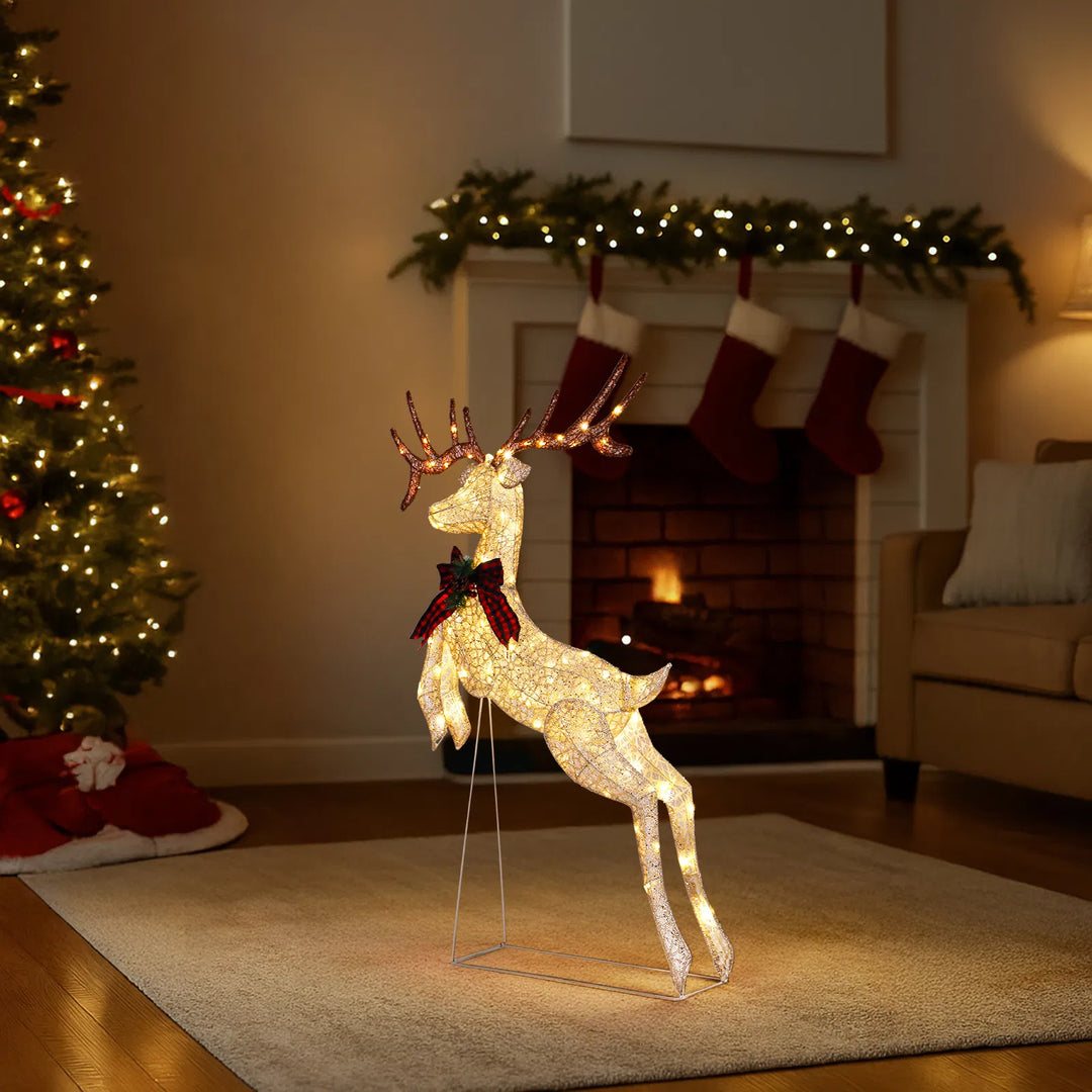 Lighted jumping reindeer with red bow