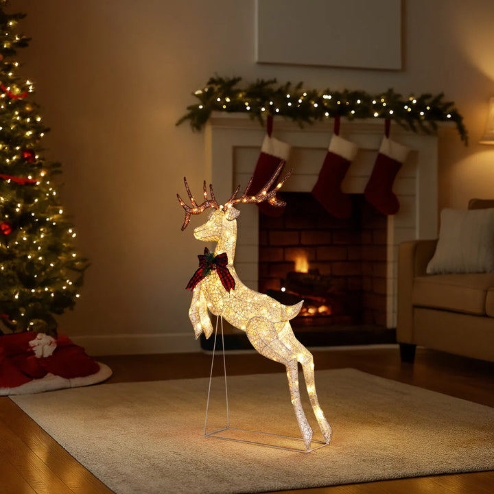 Lighted jumping reindeer with red bow