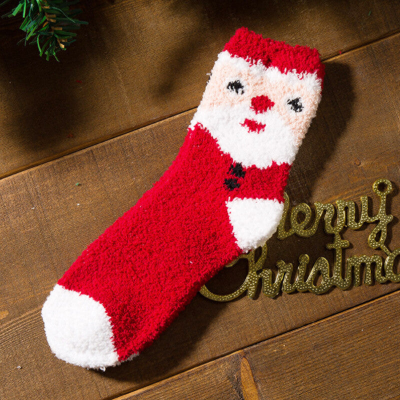 Five pairs of fuzzy Christmas socks