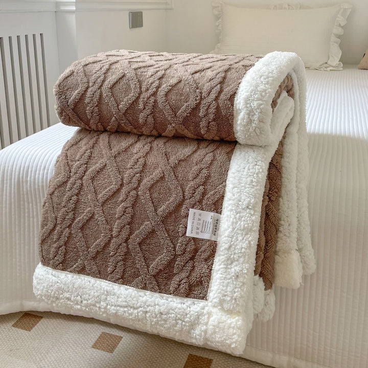 Cable-knit jacquard blanket with sherpa border
