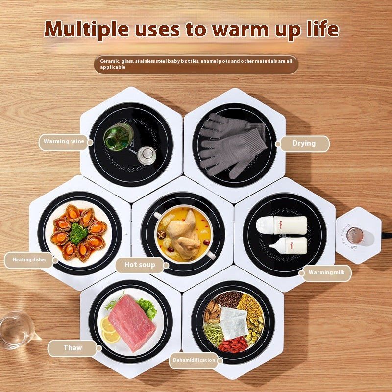 White hexagonal food warming plates joined in a cluster