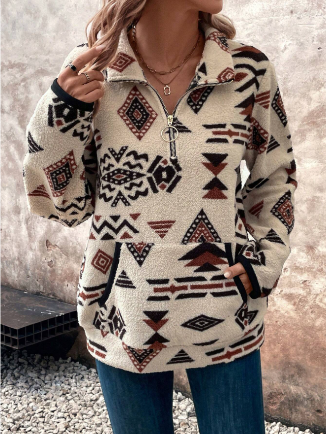 Woman in a cream half-zip fleece pullover