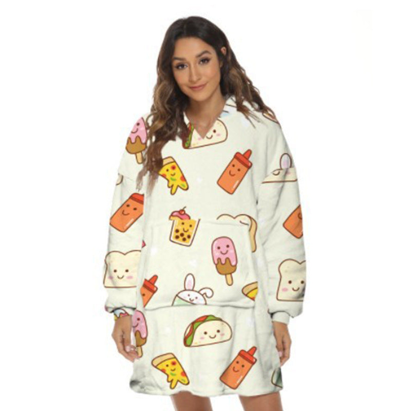 Person wearing oversized hooded blanket