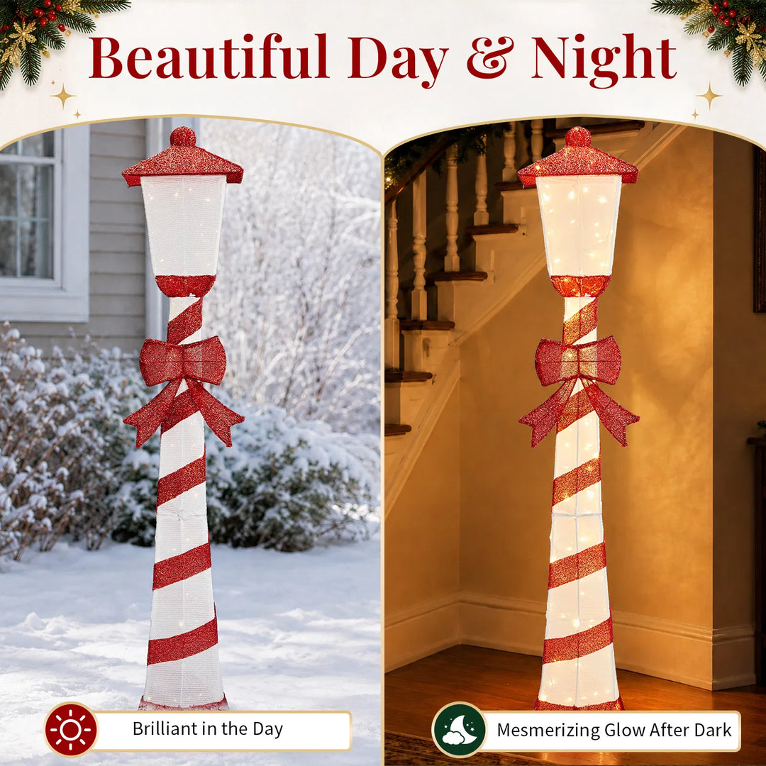 Lighted candy cane striped Christmas lamp post on a porch