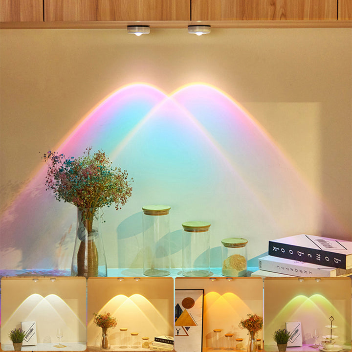 Stick-on push light glowing on a wall