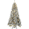 Flocked Northern pine Christmas tree lit warm