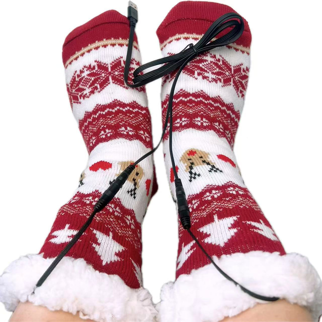 Red knitted Christmas socks with Santa pattern